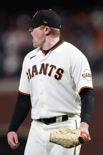 Logan Webb of the San Francisco Giants reacts after a double play against the Los Angeles Dodgers during the fourth inning of Game 1 of the National...