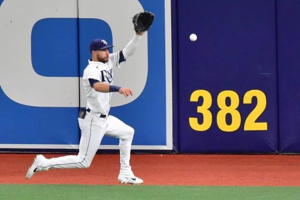 Kevin Kiermaier of the Tampa Bay Rays fields a two RBI single by Enrique Hernandez of the Boston Red Sox in the ninth inning during Game 2 of the...