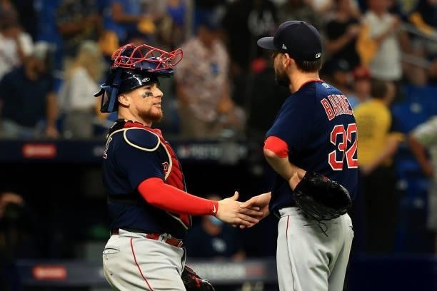 Matt Barnes and Christian Vazquez of the Boston Red Sox celebrate their 14 to 6 win over the Tampa Bay Rays during Game 2 of the American League...
