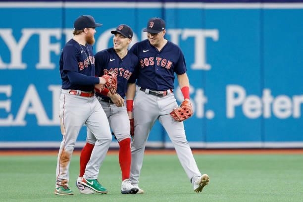 The Boston Red Sox celebrate their 14 to 6 win over the Tampa Bay Rays during Game 2 of the American League Division Series at Tropicana Field on...