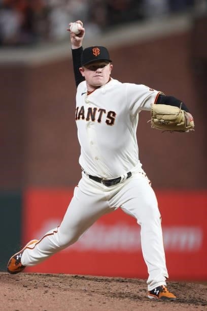 Logan Webb of the San Francisco Giants delivers a pitch against the Los Angeles Dodgers during the sixth inning of Game 1 of the National League...