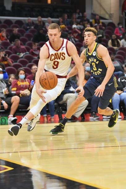 Dylan Windler of the Cleveland Cavaliers drives to the basket around Chris Duarte of the Indiana Pacers during the third quarter at Rocket Mortgage...