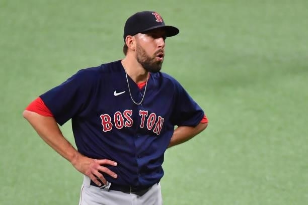 Matt Barnes of the Boston Red Sox reacts to their 14 to 6 win over the Tampa Bay Rays during Game 2 of the American League Division Series at...