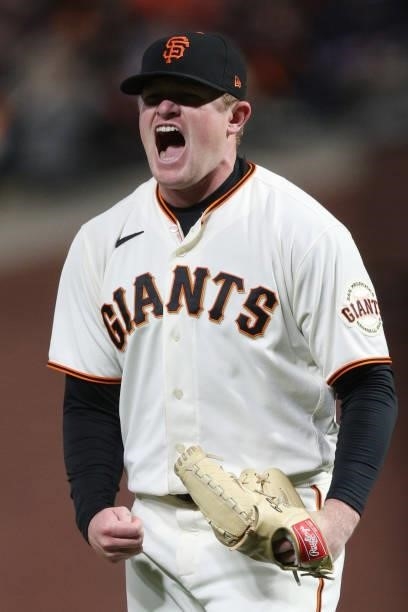 Logan Webb of the San Francisco Giants reacts after striking out Cody Bellinger of the Los Angeles Dodgers during the seventh inning of Game 1 of the...
