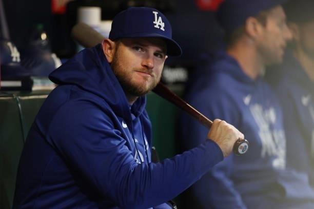 Max Muncy of the Los Angeles Dodgers looks on from the dugout against the San Francisco Giants during Game 1 of the National League Division Series...