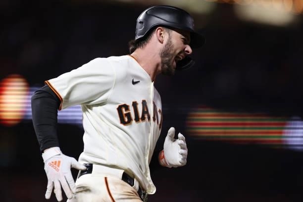 Kris Bryant of the San Francisco Giants celebrates after hitting a solo home run off Walker Buehler of the Los Angeles Dodgers during the seventh...