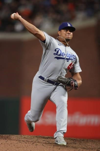 Brusdar Graterol of the Los Angeles Dodgers delivers a pitch against the San Francisco Giants during the seventh inning of Game 1 of the National...