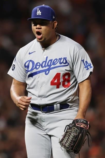 Brusdar Graterol of the Los Angeles Dodgers reacts against the San Francisco Giants during the seventh inning of Game 1 of the National League...