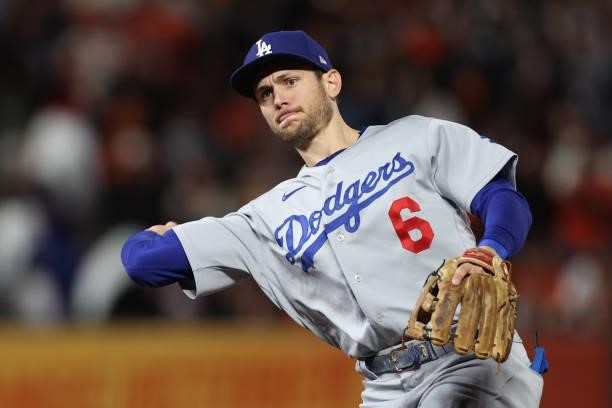 Trea Turner of the Los Angeles Dodgers throws out a runner against the San Francisco Giants during the seventh inning of Game 1 of the National...