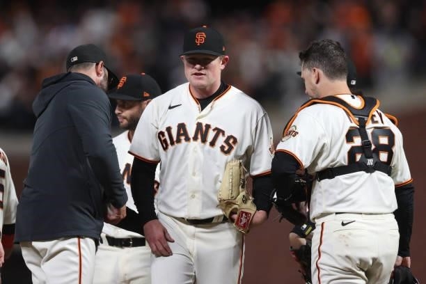 Logan Webb of the San Francisco Giants is taken out of the game by manager Gabe Kapler against the Los Angeles Dodgers during the eighth inning of...