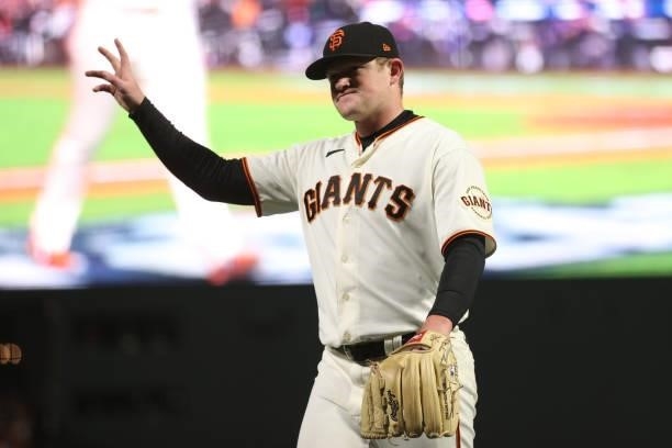 Logan Webb of the San Francisco Giants acknowledges the crowd as he is taken out of the game against the Los Angeles Dodgers during the eighth inning...