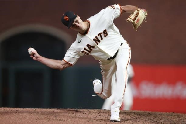 Tyler Rogers of the San Francisco Giants delivers a pitch against the Los Angeles Dodgers during the eighth inning of Game 1 of the National League...