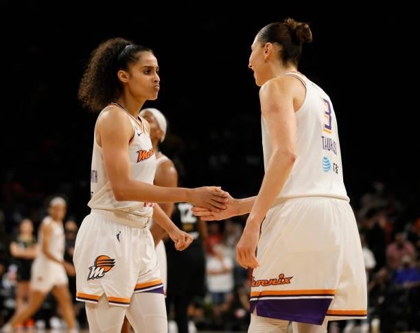 Skylar Diggins-Smith and Diana Taurasi of the Phoenix Mercury celebrate as time expires in Game Five of the 2021 WNBA Playoffs semifinals against the...