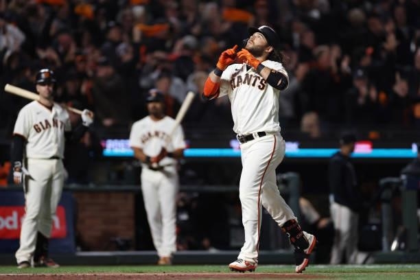Brandon Crawford of the San Francisco Giants celebrates after hitting a solo home run off Alex Vesia of the Los Angeles Dodgers during the eighth...
