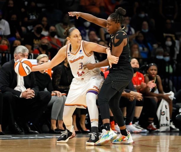 Diana Taurasi of the Phoenix Mercury passes against Chelsea Gray of the Las Vegas Aces during Game Five of the 2021 WNBA Playoffs semifinals at...