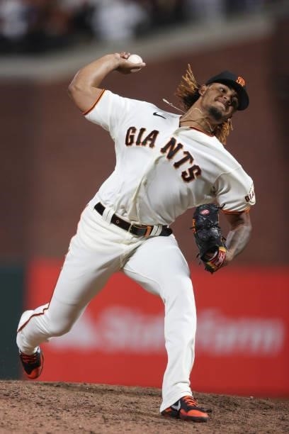 Camilo Doval of the San Francisco Giants delivers a pitch against the Los Angeles Dodgers during the ninth inning of Game 1 of the National League...