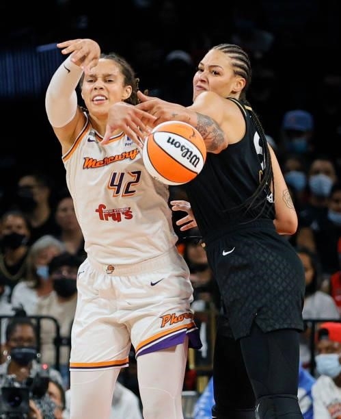 Liz Cambage of the Las Vegas Aces fouls Brittney Griner of the Phoenix Mercury during Game Five of the 2021 WNBA Playoffs semifinals at Michelob...