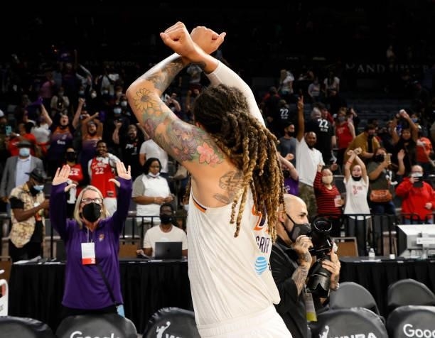 Brittney Griner of the Phoenix Mercury gestures to fans as she leaves the court after the team defeated the Las Vegas Aces 87-84 in Game Five of the...