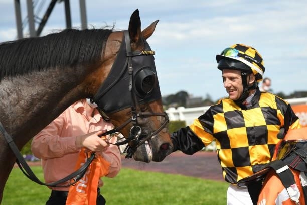 Brett Prebble riding Probabeel after winning race 6, the Neds Might And Power, during Melbourne Racing at Caulfield Racecourse on October 09, 2021 in...