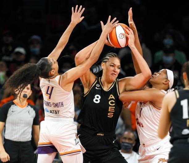 Liz Cambage of the Las Vegas Aces is guarded by Skylar Diggins-Smith and Kia Vaughn of the Phoenix Mercury of the Phoenix Mercury during Game Five of...