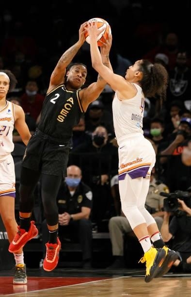 Riquna Williams of the Las Vegas Aces steals the ball from Skylar Diggins-Smith of the Phoenix Mercury during Game Five of the 2021 WNBA Playoffs...