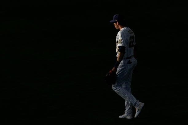 Picture of Christian Yelich of the Milwaukee Brewers in left field as the sun shines through the stadium panels against the Atlanta Braves during...