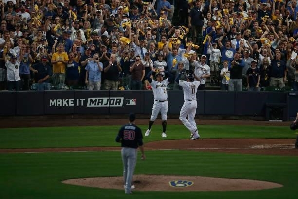 Brewer fans react and celebrate after a two run homer by Rowdy Tellez of the Milwaukee Brewers in the seventh inning against the Atlanta Braves...