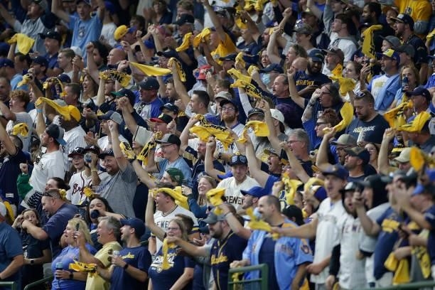 Brewers fans wave the yellow towel during Game One of the National League division series against the Atlanta Braves at American Family Field on...