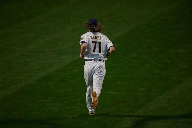 Josh Hader of the Milwaukee Brewers enters the game in the ninth inning against the Atlanta Braves during Game One of the National League division...
