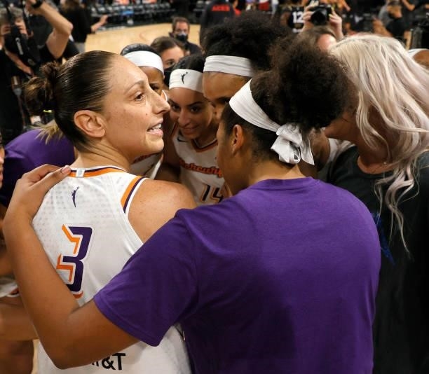 Diana Taurasi of the Phoenix Mercury celebrates with teammates after defeating the Las Vegas Aces 87-84 in Game Five of the 2021 WNBA Playoffs...