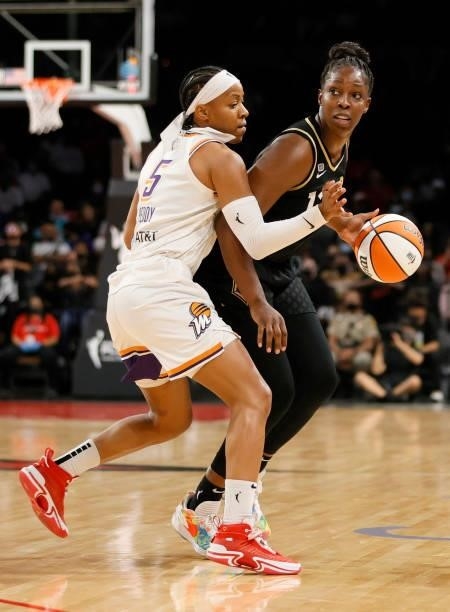Chelsea Gray of the Las Vegas Aces is guarded by Shey Peddy of the Phoenix Mercury during Game Five of the 2021 WNBA Playoffs semifinals at Michelob...