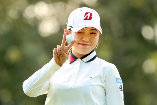 Yuri Yoshida of Japan poses after the birdie putt on the 14th green during the second round of the Stanley Ladies at Tomei Country Club on October 9,...