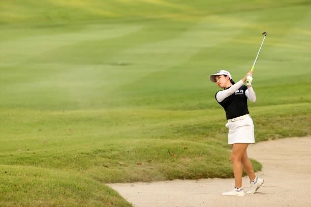 Sakura Koiwai of Japan hits her third shot out from a bunker on the 18th hole during the second round of the Stanley Ladies at Tomei Country Club on...