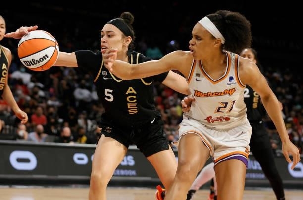 Dearica Hamby of the Las Vegas Aces and Brianna Turner of the Phoenix Mercury go after a rebound during Game Five of the 2021 WNBA Playoffs...