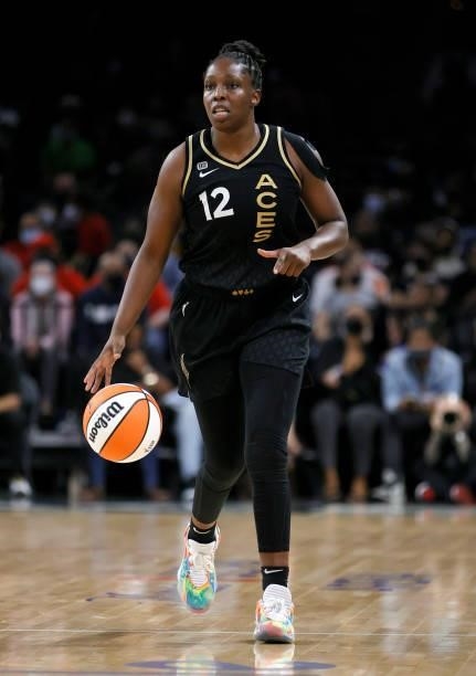 Chelsea Gray of the Las Vegas Aces brings the ball up the court against the Phoenix Mercury during Game Five of the 2021 WNBA Playoffs semifinals at...