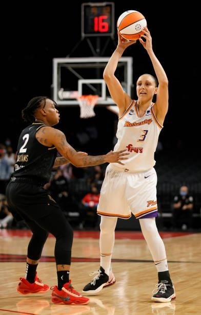 Diana Taurasi of the Phoenix Mercury looks to pass against Riquna Williams of the Las Vegas Aces during Game Five of the 2021 WNBA Playoffs...