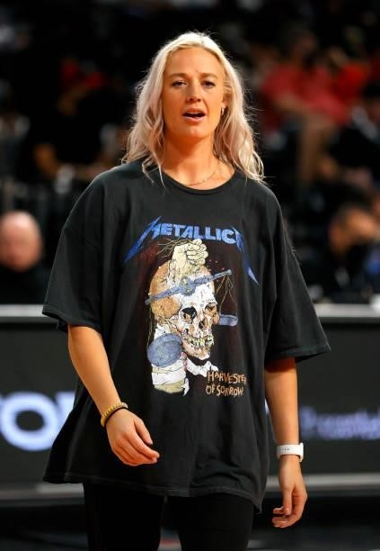 Sophie Cunningham of the Phoenix Mercury wears a Metallica concert T-Shirt as she watches teammates warm up before Game Five of the 2021 WNBA...