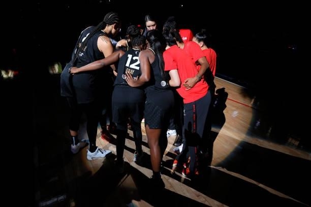 The Las Vegas Aces huddle on the court before Game Five of the 2021 WNBA Playoffs semifinals against the Phoenix Mercury at Michelob ULTRA Arena on...