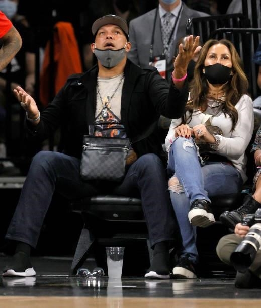 Former Major League Baseball player David Justice and his wife, fashion designer and model Rebecca Villalobos Justice, attend Game Five of the 2021...