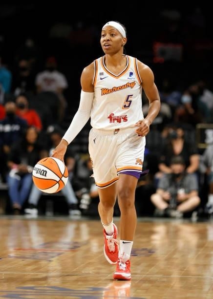 Shey Peddy of the Phoenix Mercury brings the ball up the court against the Las Vegas Aces during Game Five of the 2021 WNBA Playoffs semifinals at...