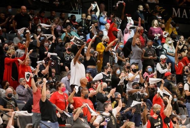 Fans react during Game Five of the 2021 WNBA Playoffs semifinals between the Phoenix Mercury and the Las Vegas Aces at Michelob ULTRA Arena on...