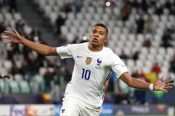 Kylian Mbappe of France celebrates after scoring a second half penalty to level the game at 2-2 during the UEFA Nations League 2021 Semi-final match...