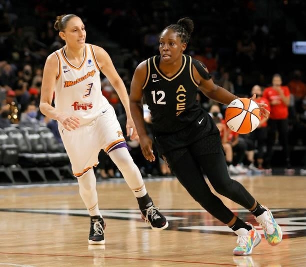 Chelsea Gray of the Las Vegas Aces drives against Diana Taurasi of the Phoenix Mercury during Game Five of the 2021 WNBA Playoffs semifinals at...