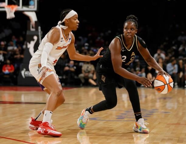 Chelsea Gray of the Las Vegas Aces is guarded by Shey Peddy of the Phoenix Mercury during Game Five of the 2021 WNBA Playoffs semifinals at Michelob...