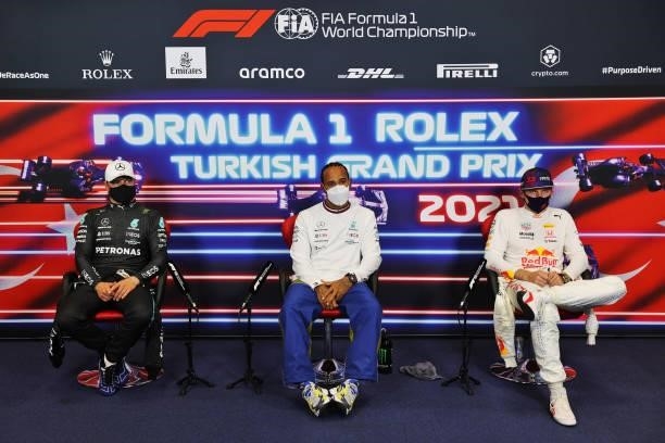 Pole position qualifier Lewis Hamilton of Great Britain and Mercedes GP, second place qualifier Valtteri Bottas of Finland and Mercedes GP and third...