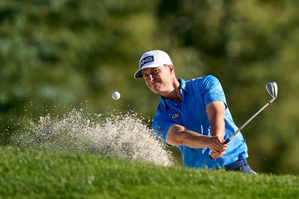 Calum Hill of Scotland plays a shot from a bunker during Day Three of The Open de Espana at Club de Campo Villa de Madrid on October 09, 2021 in...