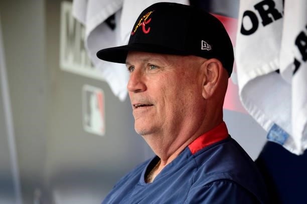 Manager Brian Snitker of the Atlanta Braves in the dugout prior to game 2 of the National League Division Series against the Milwaukee Brewers at...