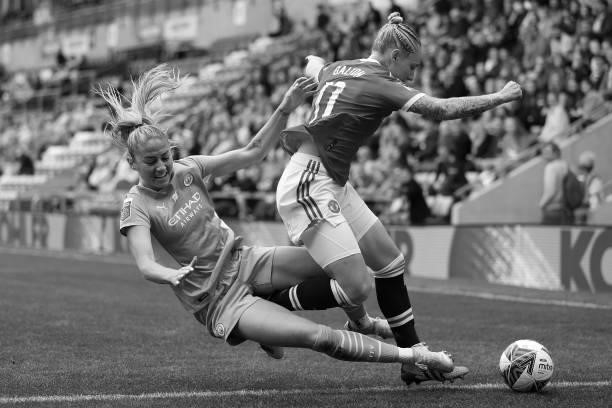 Janine Beckie of Manchester City battles for possession with Leah Galton of Manchester United during the Barclays FA Women's Super League match...