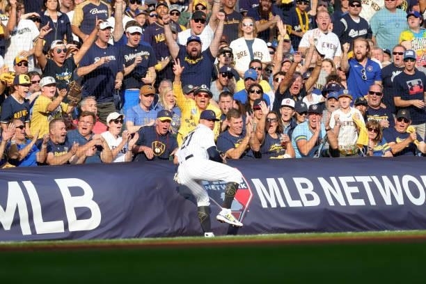 Willy Adames of the Milwaukee Brewers catches a foul ball in the first inning during game 2 of the National League Division Series against the...