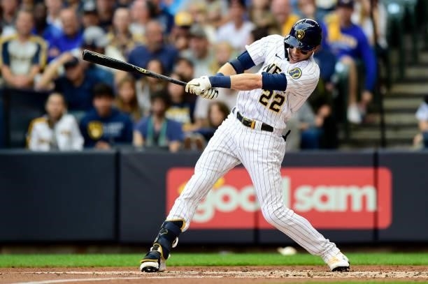 Christian Yelich of the Milwaukee Brewers hits a single in the second inning during game 2 of the National League Division Series against the Atlanta...